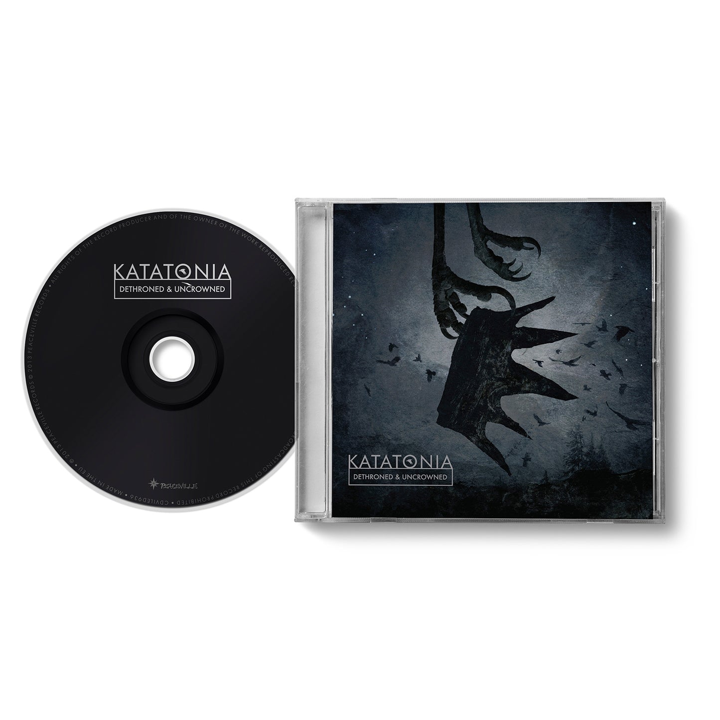 Katatonia’s Dethroned & Uncrowned CD with case, reworking Dead End Kings. Features dark abstract art of a bird-like creature and flying birds on a moody blue cover. Brand: Katatonia. Peaceville CD edition.