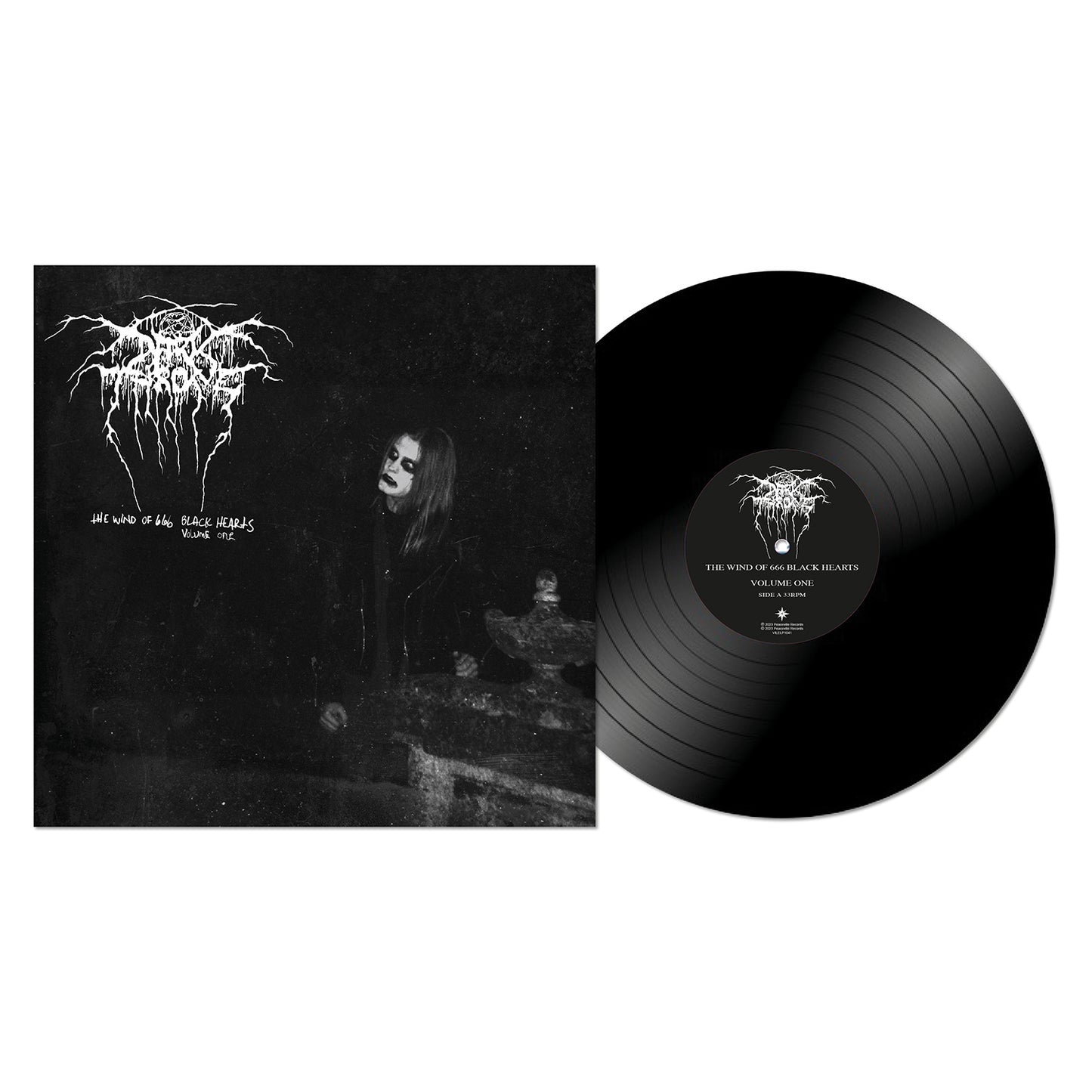 A vinyl record partly out of its sleeve. The cover features a black-and-white photo of a corpse-painted figure in an eerie outdoor setting, with gothic text above—classic Norwegian black metal style from Darkthrone.