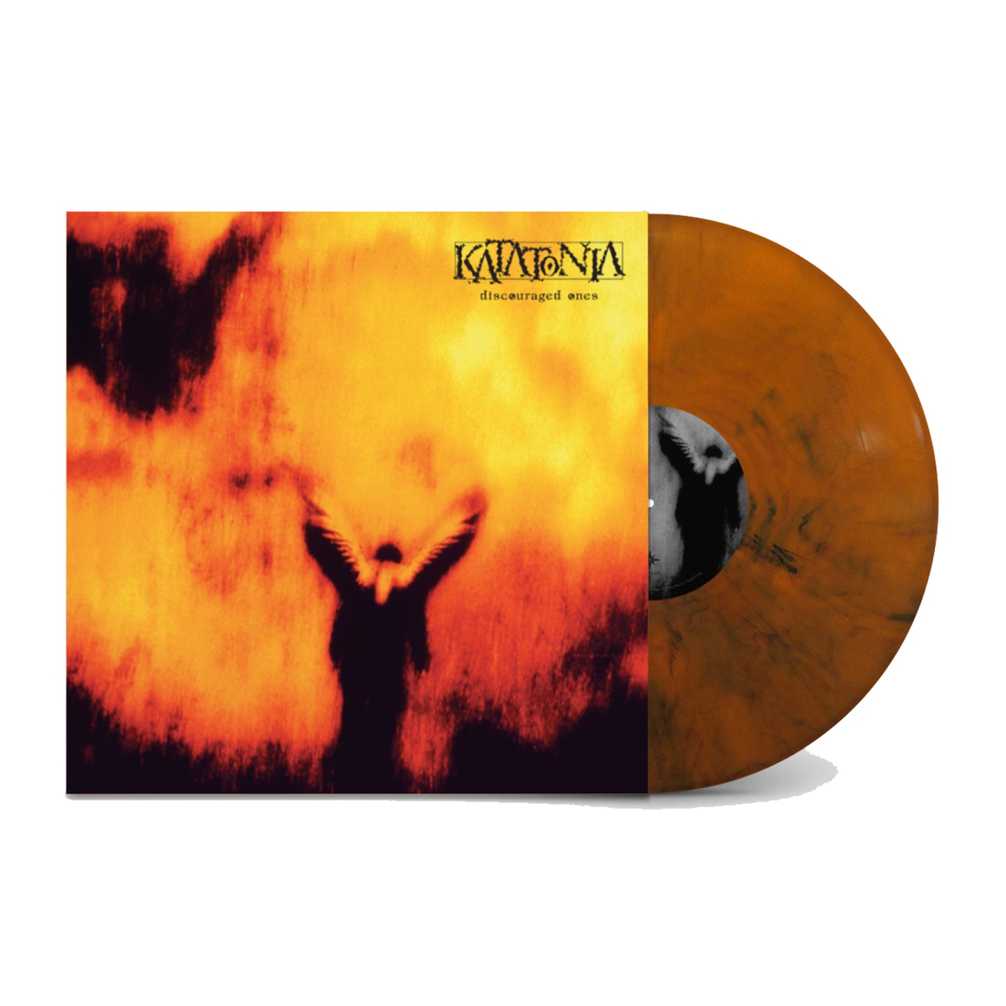 A limited orange marble vinyl record from Katatonia partially slides out of its sleeve. The cover features a yellow-orange blurred background with a dark, winged silhouette and “Katatonia - Discouraged Ones” at the top right.
