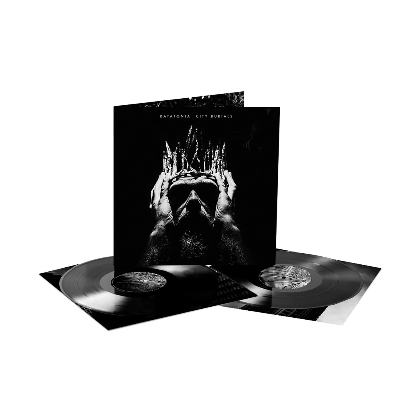 Two black vinyl records and a sleeve with monochrome art of a person holding their head. The sleeve reads Katatonia City Burials, highlighting the progressive rock album’s distinctive style. Brand: Katatonia.