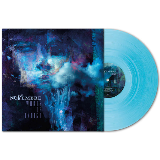 This limited Curacao vinyl by Novembre comes in light blue, partially pulled from a cover displaying abstract dark blue and purple art with a ghostly face—perfect for the atmospheric doom metal album Words of Indigo.