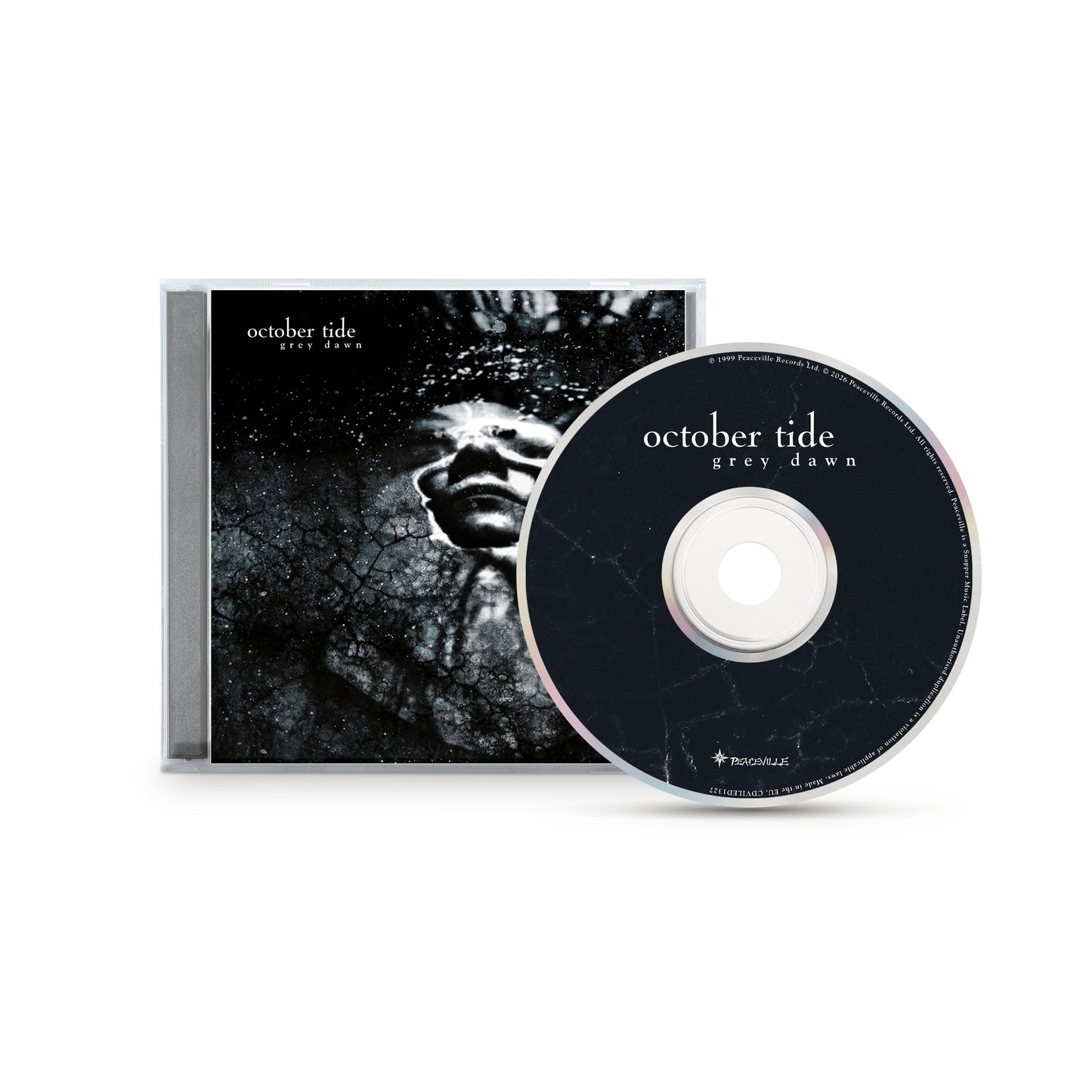 CD and case of "Grey Dawn" by October Tide, featuring a grayscale cracked-texture face with closed eyes on the cover. The black disc has white text and matching crack patterns. Brand: October Tide.